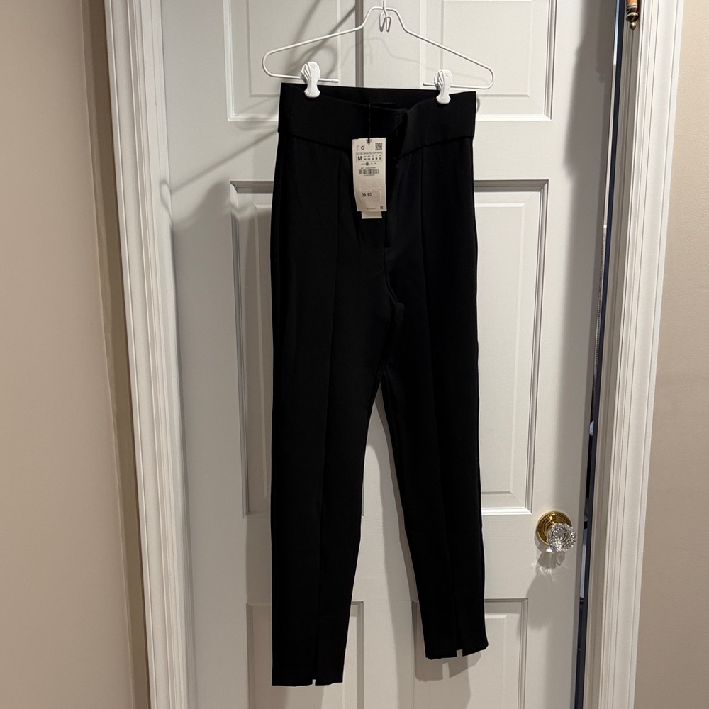 Zara, NWT, Women’s Black Legging/pants with front slit detail at bottom.